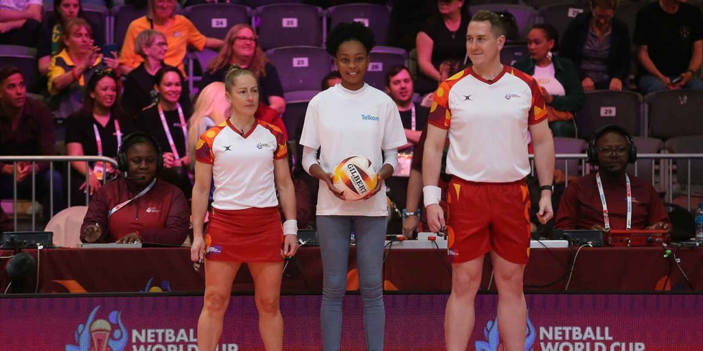 Officials with ball girl at the Netball World Cup 2023